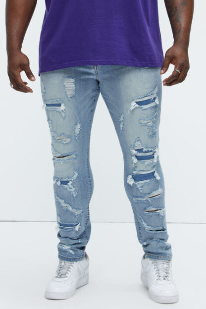 Jeans entallados rasgados estilo vintage - Image 6