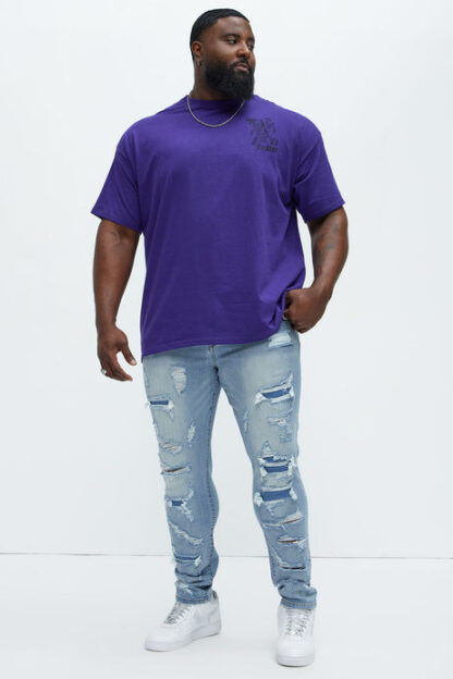 Jeans entallados rasgados estilo vintage - Image 7