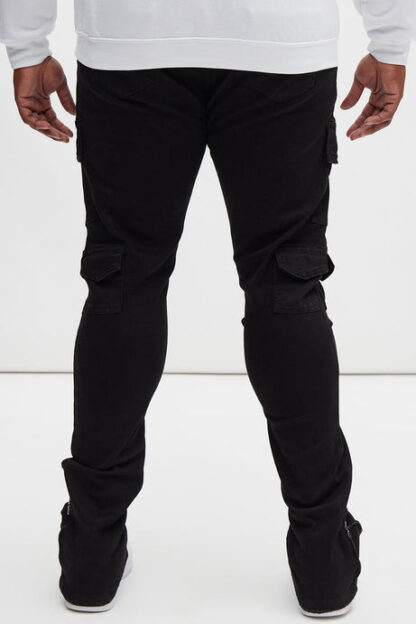 Jeans ajustados con aberturas y detalles desgastados - Image 8
